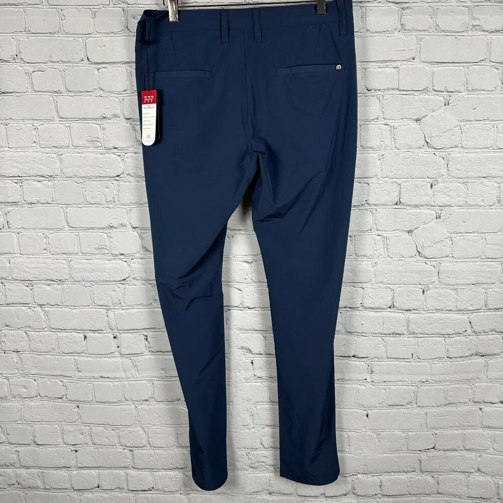 Travis Mathew Men's Majestic X Players Golf Pant,‎ W30 x L32, Blue Nights